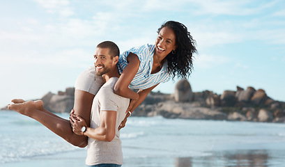 Image showing Your love brings me to life. a young couple enjoying some quality time together at the beach.