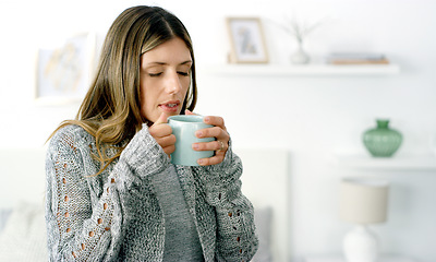 Image showing This will put me in relax mode. a woman enjoying a cup of coffee at home.