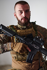 Image showing Modern warfare soldier portrait in urban environment