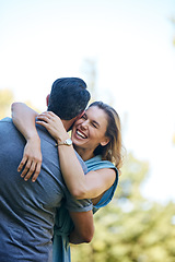 Image showing Possessions are immaterial, love is the true gold. a happy couple embracing in the park.