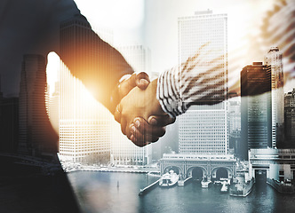 Image showing Congratulations on your outstanding achievements. Closeup shot of two unrecognizable businesspeople shaking hands in an office.