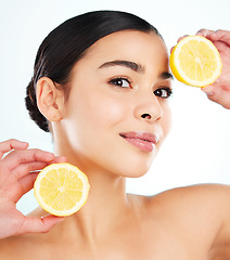 Image showing Dont be a lemon. Studio portrait of an attractive young woman posing with a lemon against a light background.