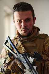 Image showing Modern warfare soldier portrait in urban environment