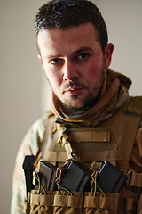 Image showing Modern warfare soldier portrait in urban environment