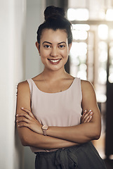 Image showing Empower yourself with ambition. Portrait of a confident young businesswoman working in a modern office.