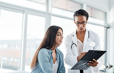 Image showing I like the results that Im seeing. a doctor showing a patient her test results.