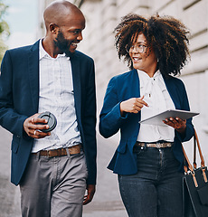 Image showing Im really impressed with how you handled that meeting. two businesspeople having a discussion while walking through the city together.