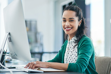 Image showing My new product is like nothing else on the market. Portrait of a young businesswoman using a computer in a modern office.