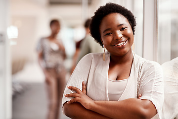 Image showing Give nothing but your best. Portrait of a confident young businesswoman standing in an office.