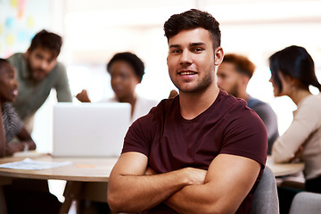 Image showing Success lies in the pathway of the dedicated. Portrait of a confident young businessman sitting in an office.