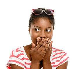 Image showing Omg, I dont believe what Im hearing. Studio shot of a young woman covering her mouth against a white background.