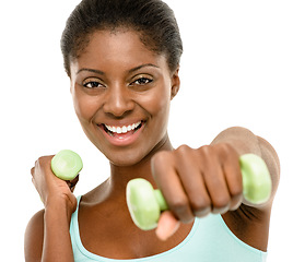 Image showing Stronger than I was yesterday. Studio shot of a fit young woman lifting weights against a white background.