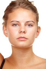 Image showing Young, confident and looking great. Studio shot of an attractive young woman isolated on white.