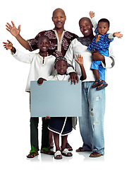 Image showing A message for all types of families. Studio shot of two african men with their kids holding a blank board, isolated on white.