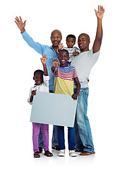 Image showing Happy to be together. Studio shot of two african men with their kids holding a blank board, isolated on white.