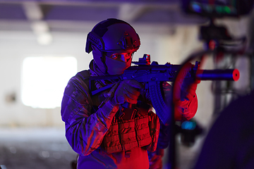 Image showing A professional cameraman captures the intense moments as a group of skilled soldiers embarks on a dangerous mission inside an abandoned building, their actions filled with suspense and bravery