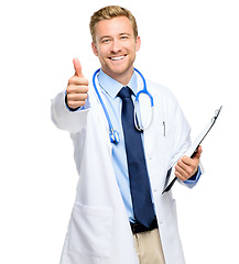 Image showing Always a pleasure to help. a handsome young doctor standing alone in the studio and showing a thumbs up.