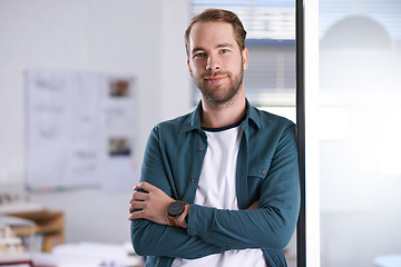 Image showing An inspired young creative. A portrait of a happy young architect standing in his office.