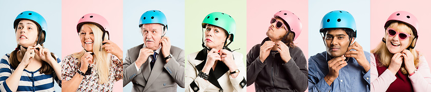 Image showing Lets get on those bikes. Collaged shot of a diverse group of people standing in the studio and posing while putting helmets on.