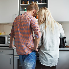 Image showing Cooking, back and couple in a kitchen for breakfast, meal or bonding at home together. Love, food and rear view of people in a house for meal prep, brunch or preparing dinner on weekend or day off