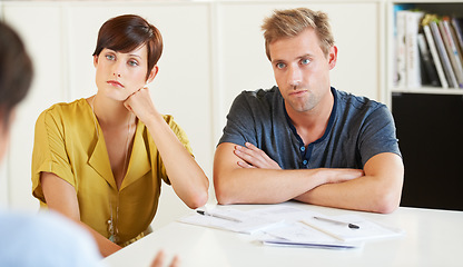 Image showing Couple, documents and stress or consultant meeting for future planning, investment or bookkeeping. Man, woman or paperwork or listening financial advisor for decision risk talk, savings policy or tax