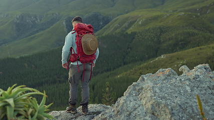 Image showing Mountains, man and hiking for fitness, exercise and wellness with fresh air, nature and workout. Male person, guy and hiker with adventure, journey and outdoor with health, training and traveling