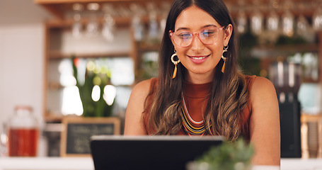 Image showing Laptop, freelance and woman in coffee shop with glasses, online research career and smile. Communication, technology and remote work, happy girl in cafe at computer, virtual assistant and reflection.