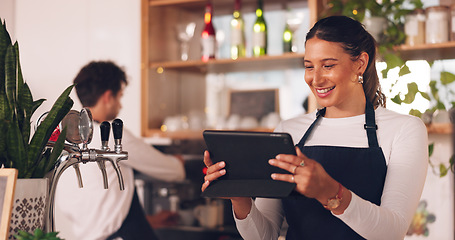 Image showing Happy woman, cafe or barista on tablet for small business owner, social media update or sales promotion. Waitress, startup or person laughing on technology for coffee shop news or restaurant online