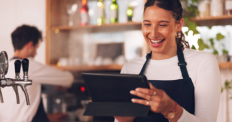 Image showing Happy woman, restaurant or barista on tablet for small business owner, social media update or sales promotion. Waitress, startup or person laughing on technology for coffee shop news or cafe online