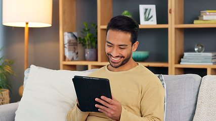 Image showing Man, tablet and social media, communication and relax on sofa with technology and happy at home. Search internet, connectivity and app with connection, video online or chat with scroll on website