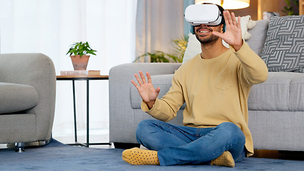 Image showing Home, virtual reality glasses and man on the floor, gaming and connection in a living room. Person, guy and player with esports, online gaming and VR eyewear with headphones, futuristic and relax