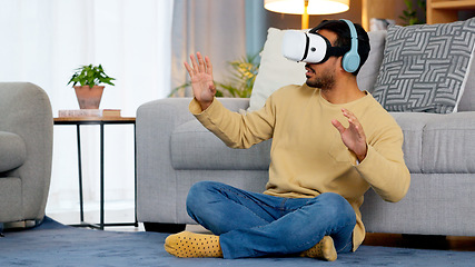 Image showing Home, virtual reality glasses and man on the floor, metaverse and online game with fun in a living room. Person, futuristic or player with esports, tech or VR eyewear with headphones or stress relief