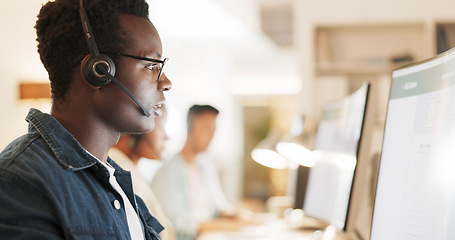 Image showing Call center, consulting and computer with black man in office for contact us, communication and customer support. Salesman, help desk and technical support with person in crm agency for telemarketing