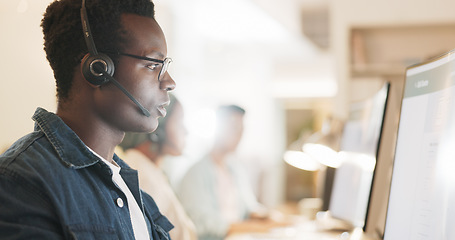 Image showing Call center, consulting and online with black man in office for contact us, communication and customer support. Salesman, help desk and technical support with person in crm agency for telemarketing