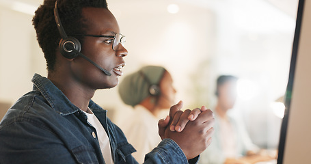 Image showing Call center, consulting and agent with black man in office for contact us, communication and customer service. Salesman, help desk and technical support with person in crm agency for telemarketing