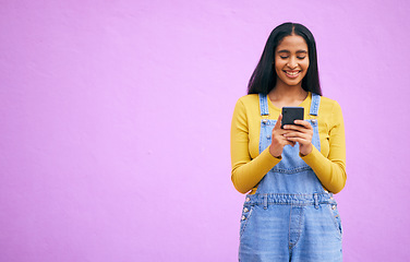 Image showing Online, happy and space with woman and phone for network, social media and communication. Contact, post and technology with person on purple background for gen z, notification and mobile app mockup