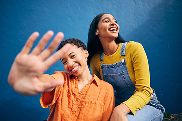 Image showing Selfie, portrait and women in city on blue background for social media, online post and profile picture. Friendship, smile and female people with hand take photo for bonding, quality time and relax