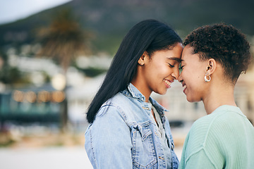 Image showing Women, lesbian and couple, hug and pride with gen z youth and romance, forehead touch outdoor. Female people together, gay relationship and lgbt with date, partner and trust with peace and support