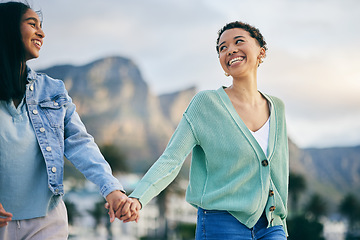 Image showing Travel, gay couple and women friends outdoor with trust, freedom and pride on travel. LGBTQ or lesbian people holding hands for walk, romantic date and commitment to happy partner in South Africa