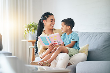 Image showing Book, love and mother with kid on sofa for storytelling in living room of happy home, teaching and bonding fun. Reading, learning and mom with child, fantasy story on couch and quality time together.