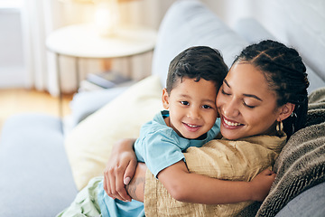 Image showing Living room, hug and happy family mom, kid and smile for Mothers Day support, security or care. Lounge couch, embrace and excited mama, mum or woman bonding with young child in home quality time