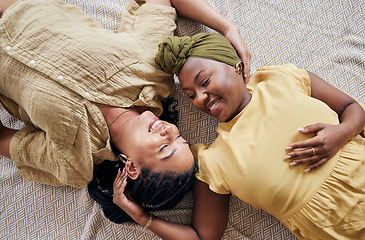 Image showing LGBT, love and couple relax, happiness and smile for home bonding, support and enjoy quality time together. Romance, top view floor and gay people, queer partner or lesbian women connect in apartment