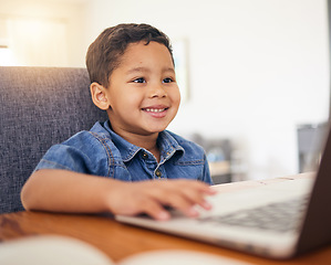 Image showing Happy little boy, laptop and elearning in virtual classroom at home for education, learning or communication. Face of child, student or kindergarten working on computer for online learning in house