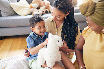 Image showing Happy lesbian couple, child and adoption in home for family bonding or quality time on living room floor. LGBTQ or gay women and little boy in happiness together for holiday weekend or break in house
