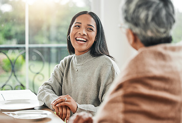 Image showing Smile, family dinner and woman laughing or happy at a table for a gathering event in a home at lunch. Joke, happiness and person at a celebration with mother for unity meal or supper in dining room