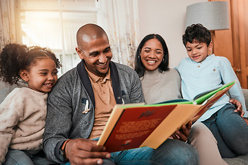 Image showing Happy, love and family reading a book together in the living room for bonding in their house. Happiness, smile and parents enjoying a novel or story with their children on sofa in the lounge at home.