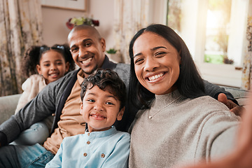 Image showing Selfie, mother and father with children in portrait, happy people at family home with bonding and love in living room. Relax on sofa together, parents and young kids with smile in picture for memory