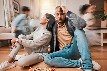 Image showing Family, adhd children and parents headache, stress and anxiety for autism management, energy fatigue or home noise. Tired mother and father on floor with chaos and hyper or fast, excited kids running