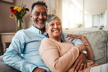 Image showing Portrait, smile and senior couple in home living room on sofa for bonding together. Face, happy and elderly man and Indian woman on couch in lounge for quality time, care and relax for love in house