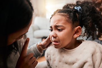 Image showing Discipline, angry and mother with girl, home and unhappy with expression, crying and naughty. Serious, female child and mama with conflict, sad and conversation with reprimand, punish kid and advice